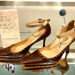 Brown stitched leather Manolo heels.
